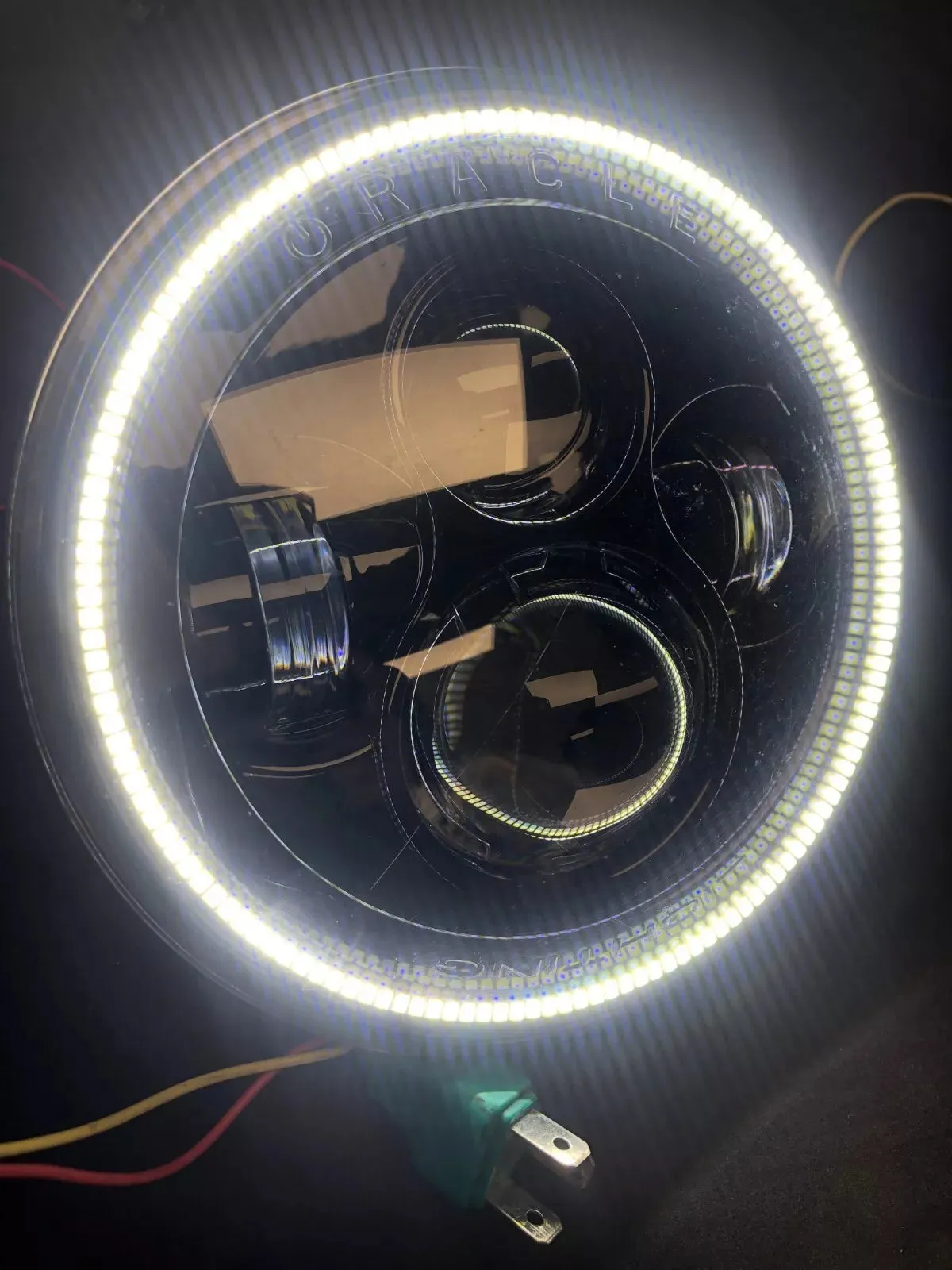 USED ORACLE 7" HIGH POWERED BLACK LED HEADLIGHTS WITH WHITE LED HALOS 5769-001
