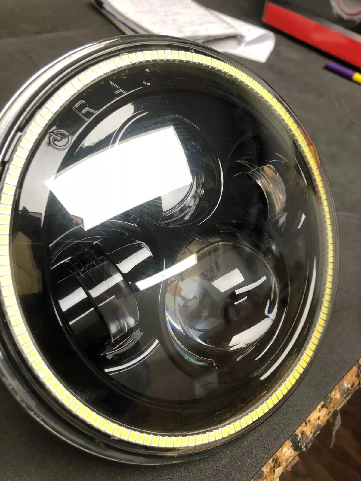 USED ORACLE 7" HIGH POWERED BLACK LED HEADLIGHTS WITH WHITE LED HALOS 5769-001